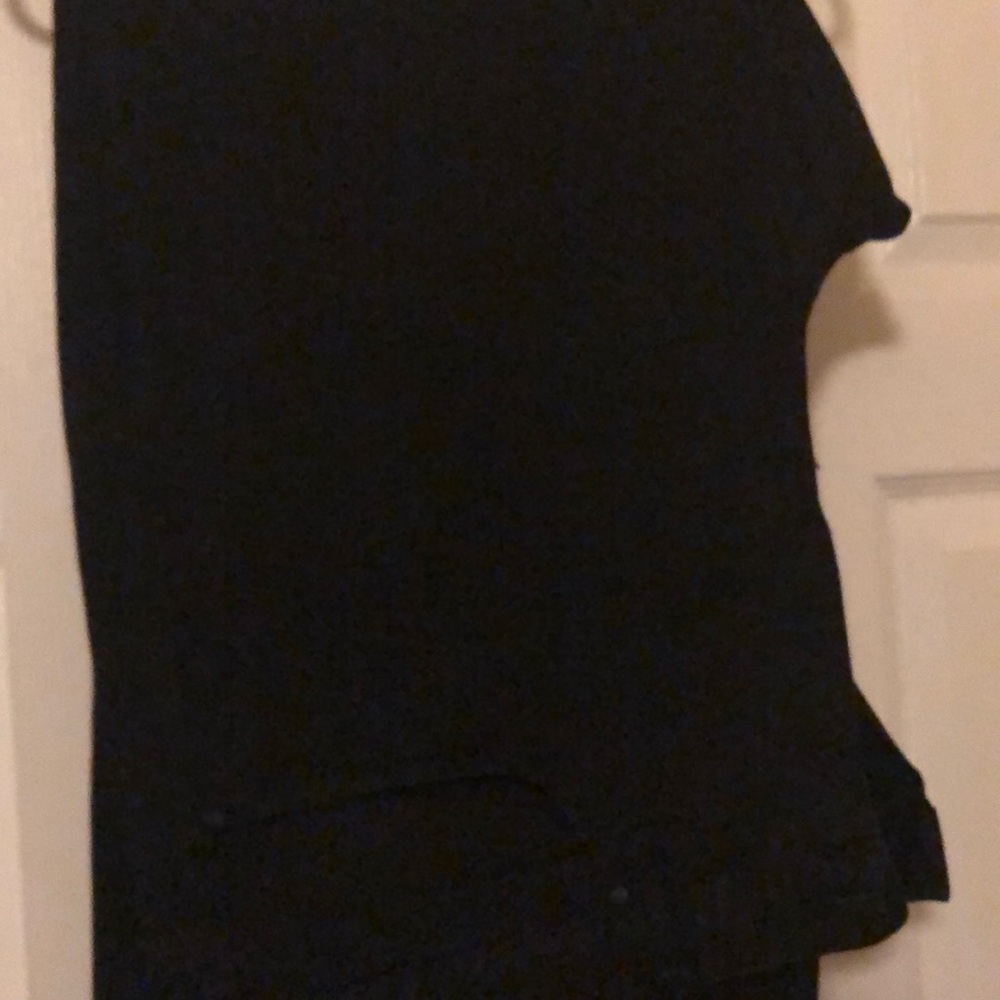 Lightly worn slim-fit black jeans.